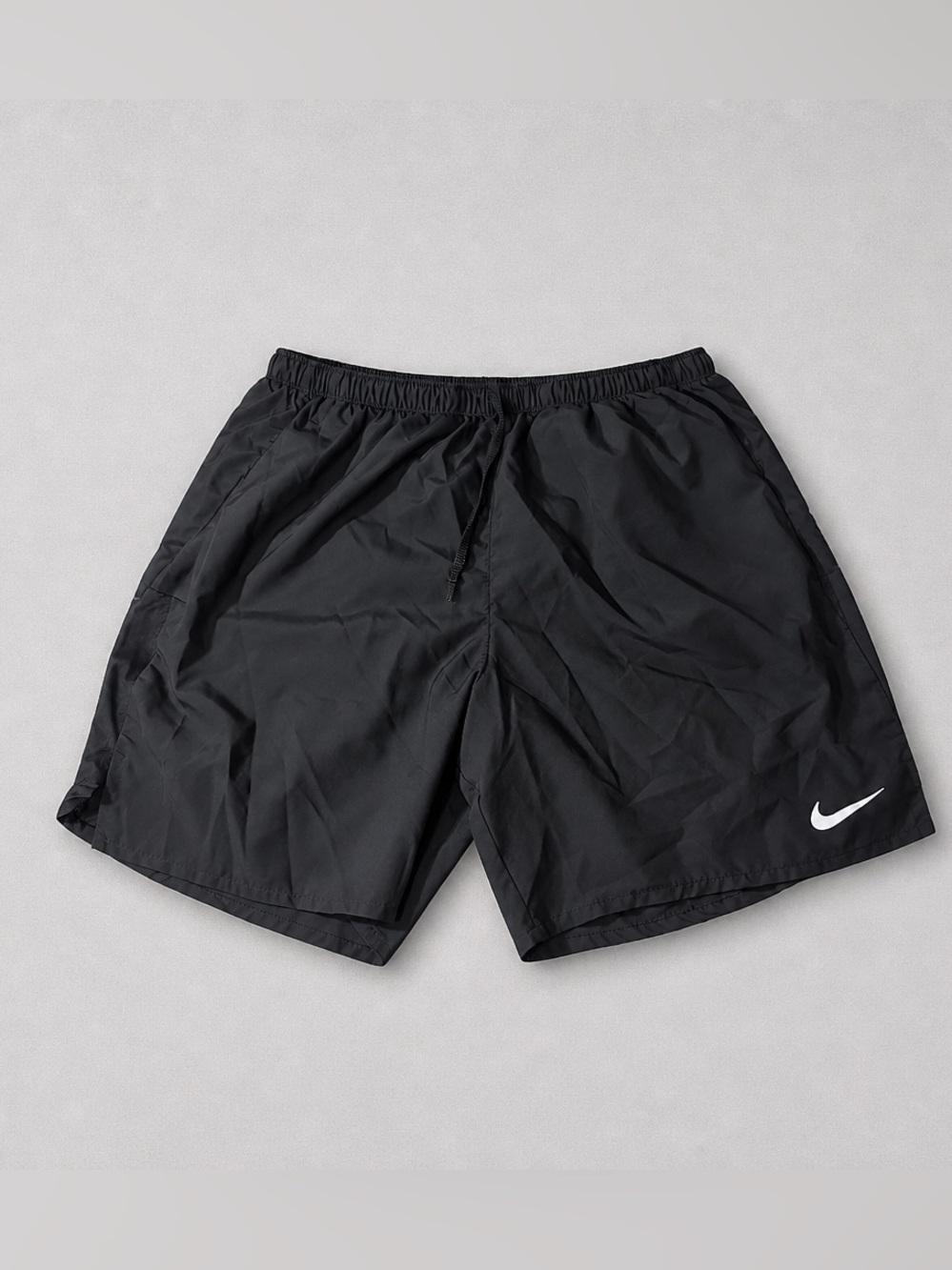 Nike Men's Black Athletic Shorts with White Swoosh